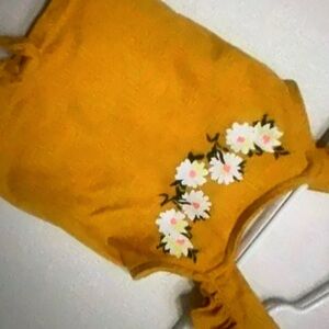 Features floral design floral top